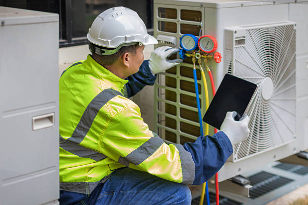 Professional Hvac technician working in Londonderry, NH